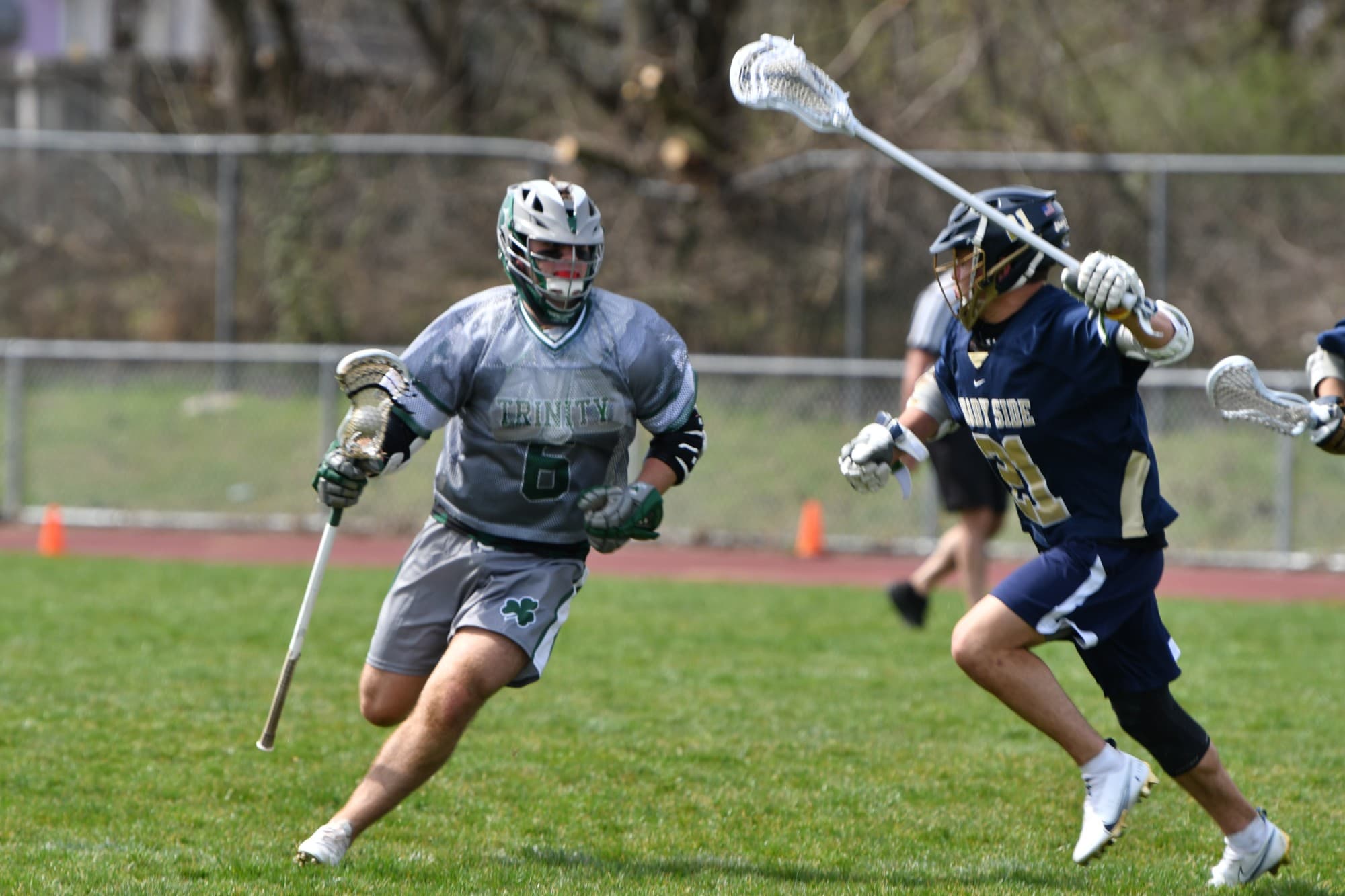 Justin Bordner, No. 6 for Trinity, carrying the ball upfield